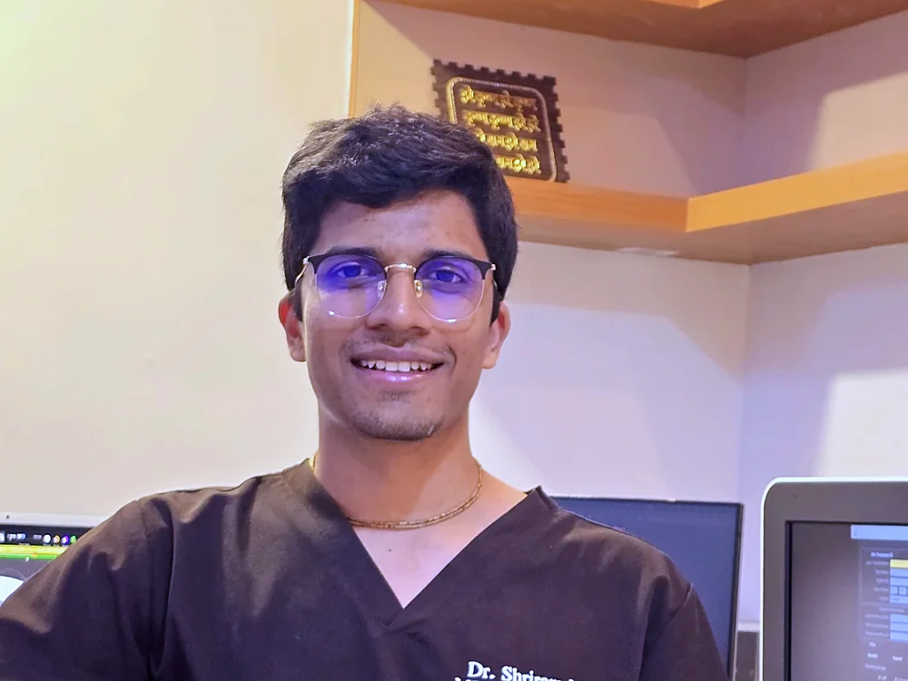 Dr. Shriram Mate beside the ultrasound console